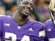 O running back do Washington Husky, Adam Muhammad, entrará no portal de transferências