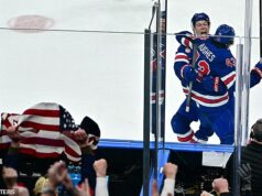 O gol de Quinn Hughes no OT derrotou a Suécia e levou a equipe dos EUA às semifinais do hóquei olímpico enquanto a visita de Trump se aproximava