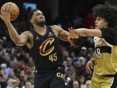 Donovan Mitchell, jogo do Cavs contra clique na rede de Young.