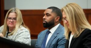 A ex-técnica do Michigan, Sharon Moore, concedeu uma audiência para contestar a prisão.