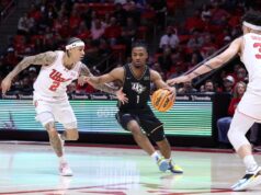 Themus Fulks, da UCF, acerta lances livres na borda do Utah.