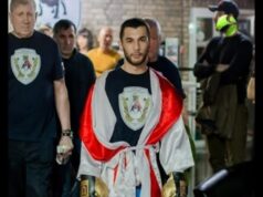 Eleanor Smidoff interrompe John Lennon na 11ª rodada para ganhar o título interino dos superpluma da WBA