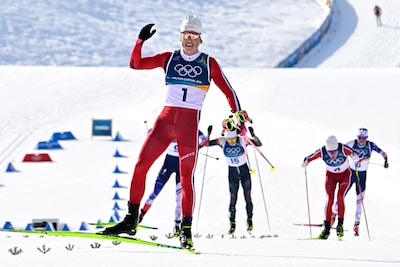 norway-s-johannes-hoesflot-klaebo-c-celebrates-as-crosses-the-finish-line-during-the-men-s-cross-cou.jpeg