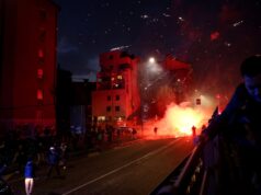 Milhares de pessoas marcharam contra as Olimpíadas de Inverno e um grupo entrou em confronto com a polícia