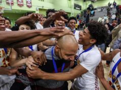 Treinador Reggie Morris Jr. Esperançosamente, sua gravata-borboleta Redondo Union