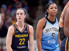 Caitlin Clark ignora o cumprimento de Angel Reese durante um jogo da equipe dos EUA.