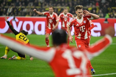 bayern-munich-s-german-midfielder-06-joshua-kimmich-celebrates-scoring-the-2-3-goal-with-his-teammat.jpeg