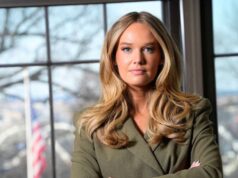 O DHS defende McLaughlin depois de alegar que a empresa de seu marido lucrou milhões com anúncios.