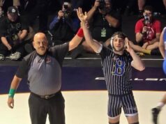 Slava Shahbazyan, de Birmingham, comemora seu título estadual de luta livre