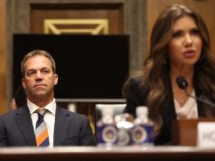 A vizinha Kristi Noem responde a relatos de seu marido se travesti.