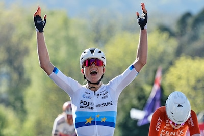 demi-vollering-of-the-netherlands-celebrates-as-she-crosses-the-finish-line-to-win-the-women-s-belgi.jpeg