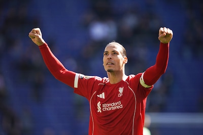 liverpool-s-virgil-van-dijk-celebrates-with-fans-after-the-english-premier-league-soccer-match-betwe.jpeg
