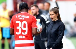 Ela fez sua estreia no Union Berlin e é a primeira mulher treinadora nas cinco grandes ligas, embora não tenha conseguido comemorar