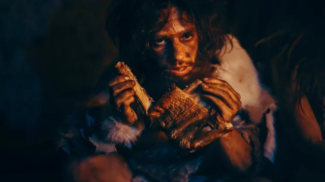 neanderthal-man-eating-meat.webp.webp