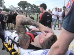 O ex-astro da AFL, Mitch Robinson, foi levado de avião ao hospital após um susto no pescoço em um jogo de futebol local