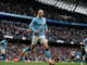 O Manchester City manteve a pressão sobre o Arsenal na corrida pelo título ao vencer o Brentford.