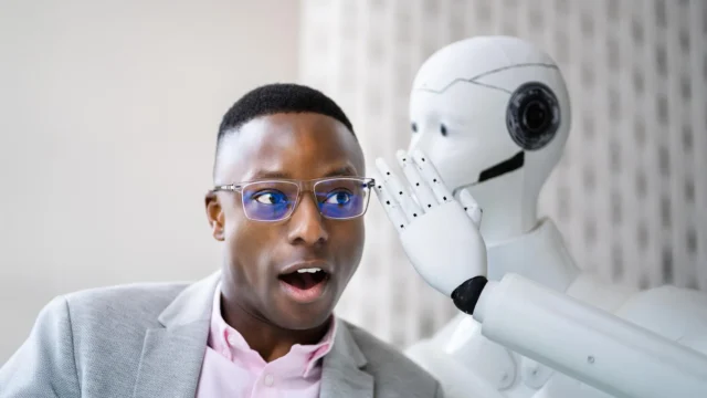 ai-cyborg-robot-whispering-secret-to-man.webp.webp