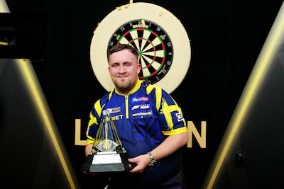 luke-littler-reacts-as-he-poses-for-photos-with-the-trophy-after-winning-the-final-of-the-2026-betmg.jpeg