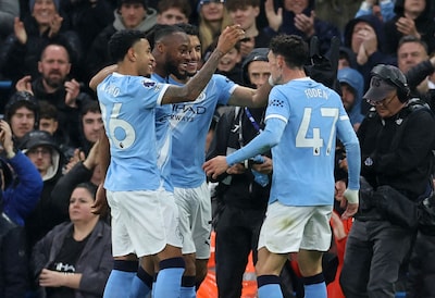 manchester-city-s-ghanaian-midfielder-42-antoine-semenyo-2l-celebrates-scoring-the-opening-goal-with.jpeg