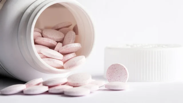 melatonin-tablets-spilled-from-bottle.webp.webp