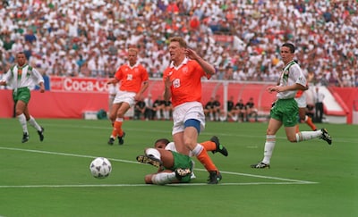 4-jul-1994-peter-van-vossen-19-of-holland-is-brought-down-by-phil-babb-14-of-ireland-during-the-1994.jpeg