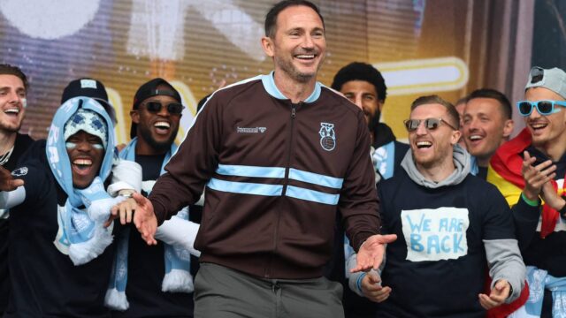 coventry-city-manager-frank-lampard-with-players-celebrate-promotion-to-the-premier-league.JPG