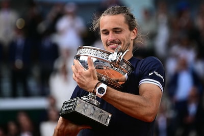 germany-s-alexander-zverev-holds-la-coupe-des-mousquetaires-trophy-after-winning-the-french-open-ten.jpeg