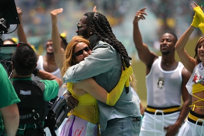 shakira-and-burna-boy-embrace-during-the-opening-ceremony-before-the-world-cup-group-a-soccer-match.jpeg