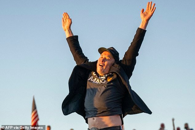 109759295-15949195-Rocket_man_There_is_speculation_that_Elon_Musk_pictured_will_mer-m-2_178302606368.jpeg