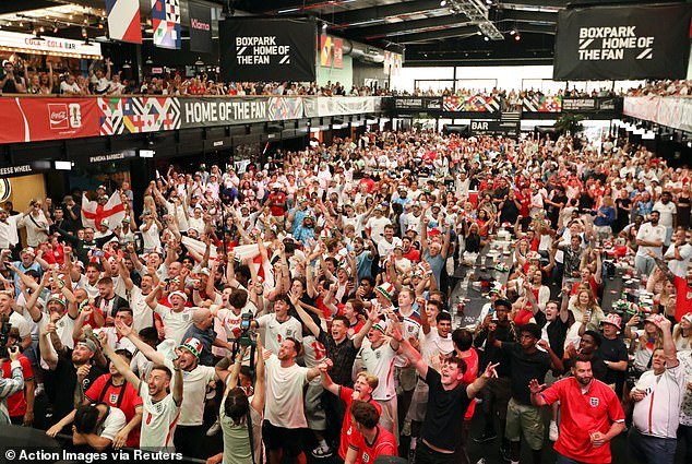 109833093-15957049-Football_fans_watched_the_England_v_Mexico_game_at_venues_includ-a-1_178340459702.jpeg