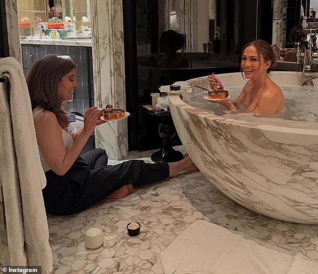 110135869-15990773-Jennifer_Lopez_set_pulses_racing_as_she_posed_up_naked_in_a_bath-m-7_178455064850.jpeg