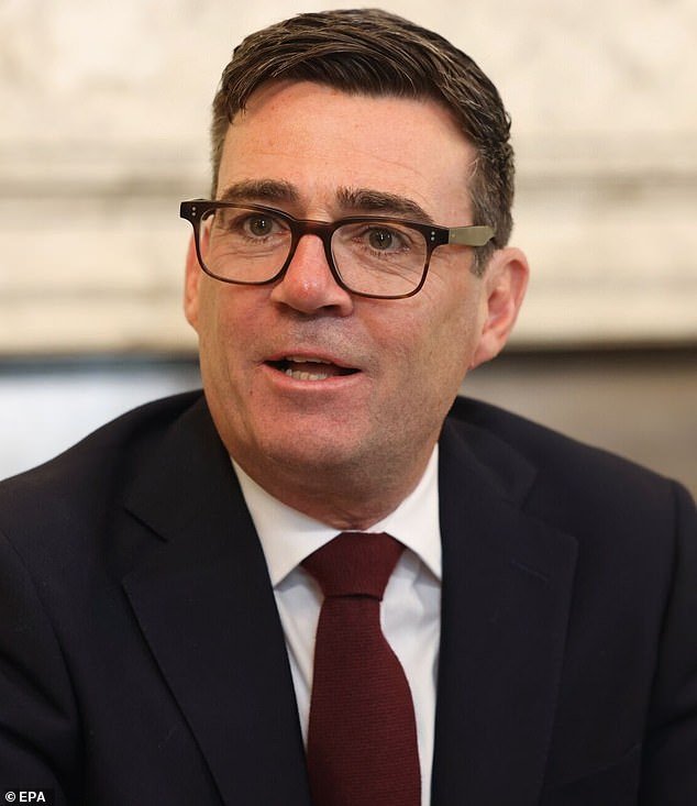 110161443-15993945-Andy_Burnham_during_his_first_Cabinet_meeting_today_one_of_his_f-m-3_178467534928.jpeg