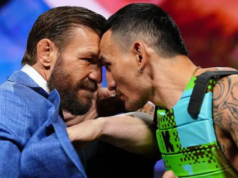 Max Holloway reage após Conor McGregor jogar seus óculos Oakley Meta durante o confronto do UFC 329.