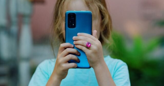 Child-using-a-blue-phone.jpg