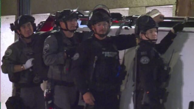 Police-in-riot-gear-near-Lownsdale-Park-in-downtown-Portland.-July-4-2026-KOIN.jpg