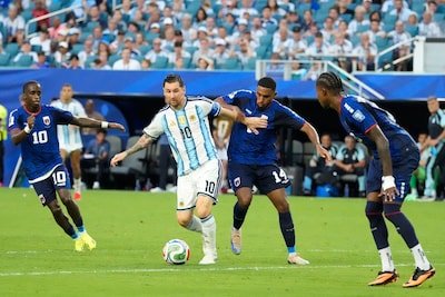 argentina-s-lionel-messi-10-controls-the-ball-while-defended-by-cape-verde-s-deroy-duarte-14-during.jpeg