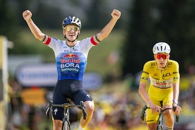 belgian-remco-evenepoel-of-red-bull-bora-hansgrohe-celebrates-as-he-crosses-the-finish-line-to-win-s.jpeg