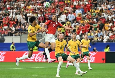 egypt-s-defender-05-ramy-rabia-c-and-australia-s-defender-25-lucas-herrington-l-jump-for-the-ball-du.jpeg