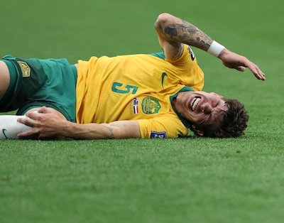 jordan-bos-of-australia-falls-down-during-the-round-of-32-match-between-australia-and-egypt-at-the-2.jpeg
