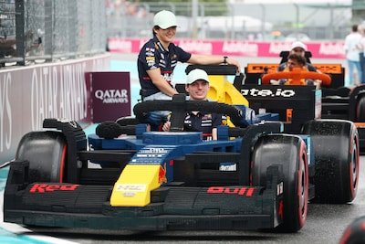 miami-florida-may-04-yuki-tsunoda-of-japan-and-oracle-red-bull-racing-and-max-verstappen-of-the-neth.jpeg
