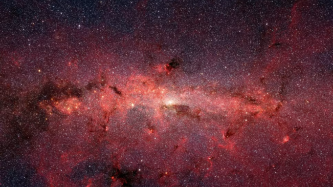 Uma galáxia de açúcar framboesa foi avistada no espaço, uma doce descoberta que pode revelar pistas sobre as origens da vida