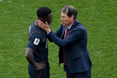 seattle-washington-july-06-folarin-balogun-20-of-the-united-states-is-consoled-by-rudi-garcia-head-c.jpeg