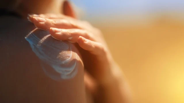 woman-applying-sunblock-cream.webp.webp