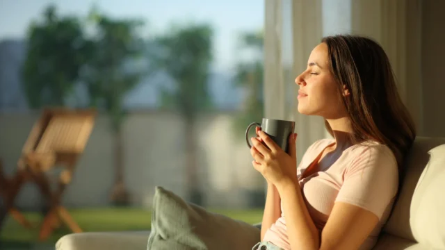 woman-enjoying-morning-coffee-and-sunshine.webp.webp